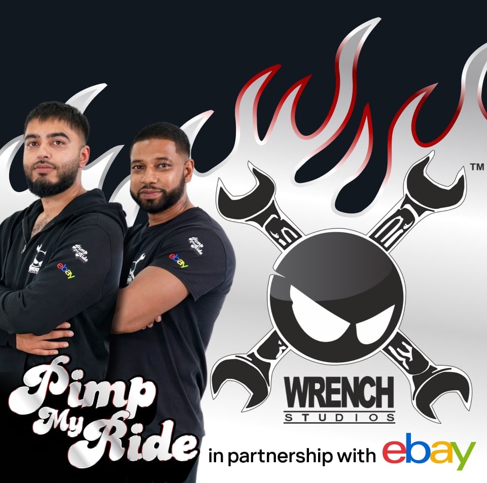 2 men with the logos of Pimp My Ride and Wrench Studios