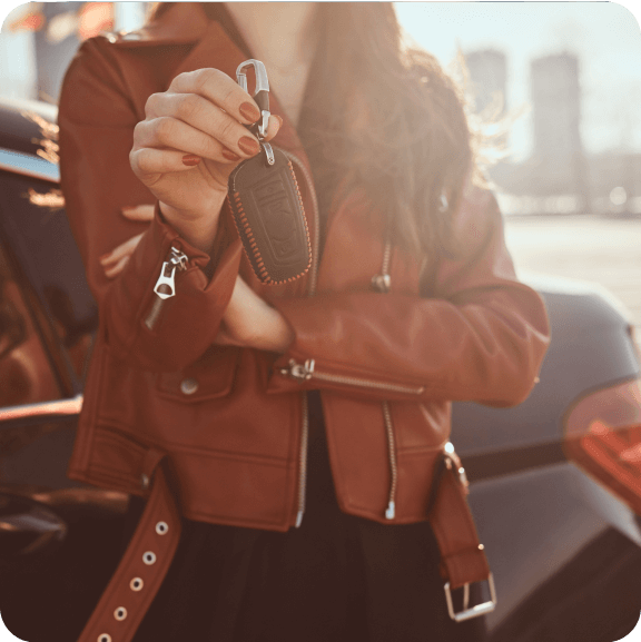 woman holding car keys