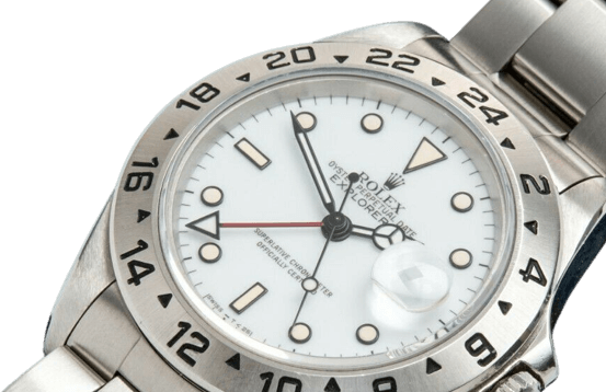 A silver Rolex watch with a white face with light gold accents.