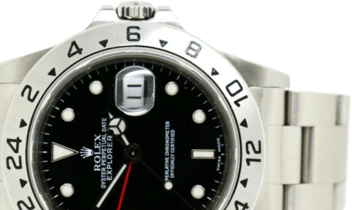A silver Rolex watch with a black face and silver accents.
