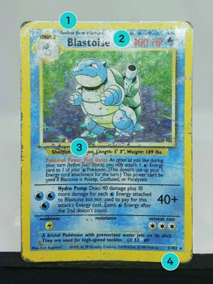 A Pokemon card in Damaged condition on a grey background.
