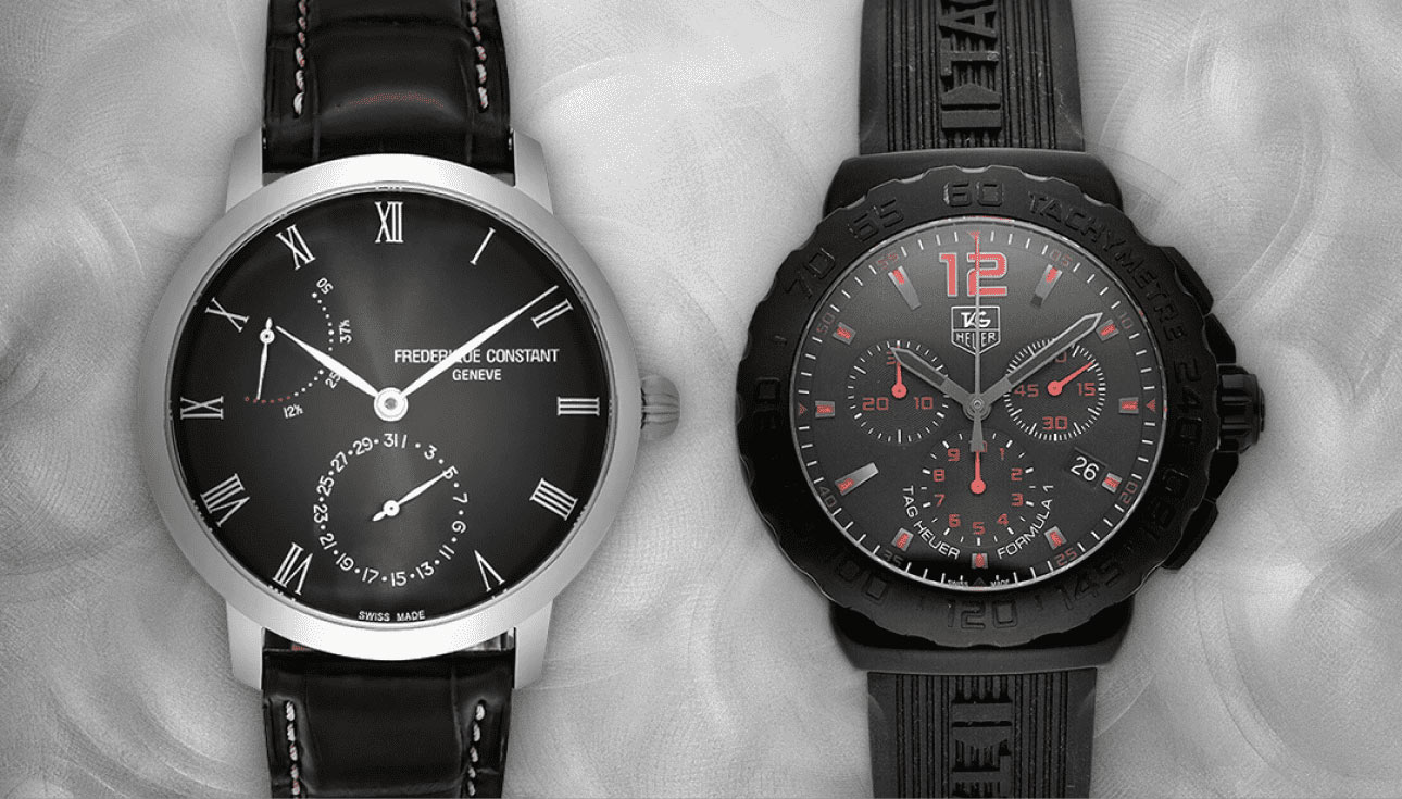  A steel Frederique Constant watch and black TAG Heuer watch on a grey backdrop. 