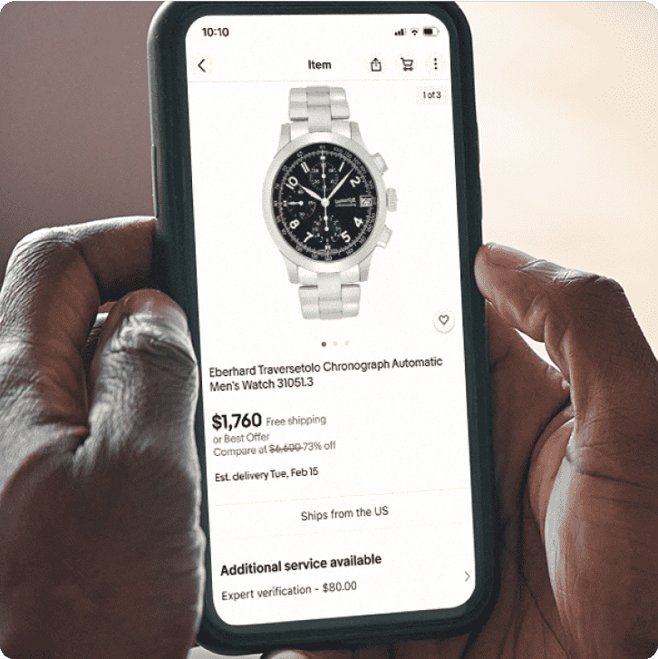 A person buys a watch on eBay with their smartphone.