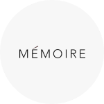 The Mémoire logo, which is the brand name written in black text with a red accent on the 'e'.