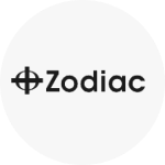 The Zodiac logo, which is the brand name in black text. To the left of that is a black outlined circle with a cross in the middle.