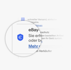 Eine Detailaufnahme einer Artikelseite zeigt im Lupenformat das Symbol für den eBay-Käuferschutz – dieser Artikel ist abgesichert