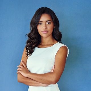 Woman dressing a white dress on a blue background