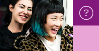two ladies smiling