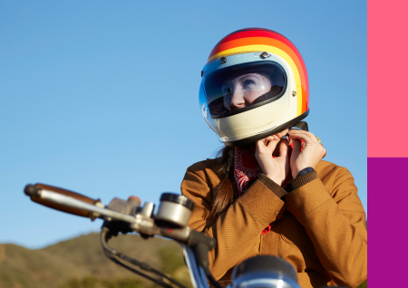 lady with helmet on motorbike