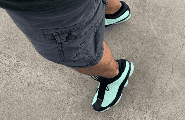 jordan 13 black and green on feet