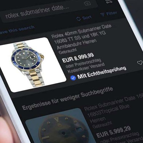 1. Halte bei deiner Suche Ausschau nach dem blauen Häkchen „Mit Echtheitsprüfung“.