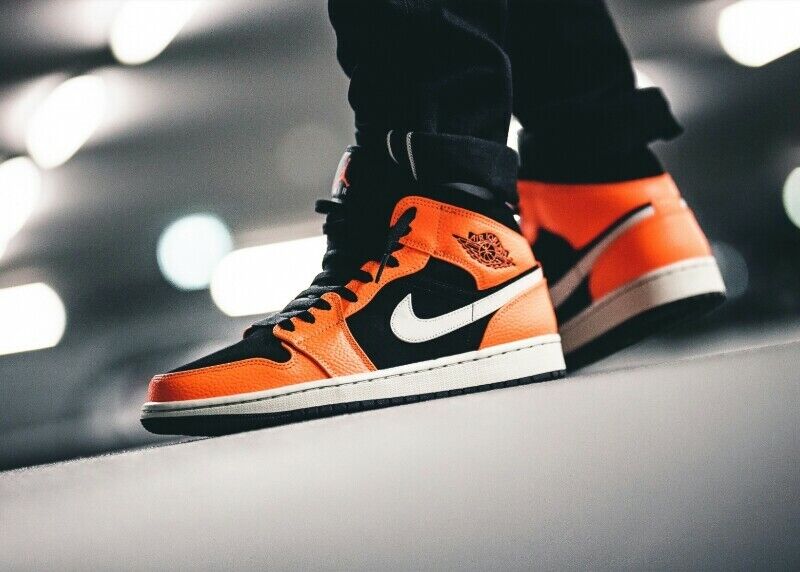 Bright, Bold Style: Orange and Black Jordans