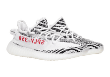 Yeezy’s Golden Shoe With the Zebra Soul thumbnail image