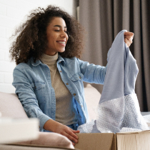 Woman unpacking clothes