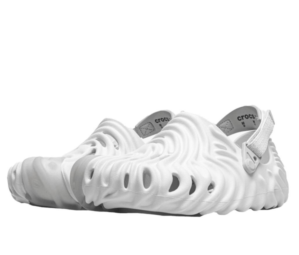 Front right angled view of a pair of white pollex clog crocs.