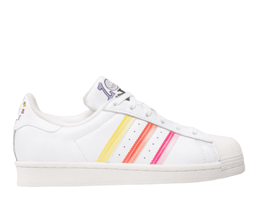 Side view of a white low top adidas sneaker with yellow, orange, and pink stripes along the side and colored lettering on the tongue.