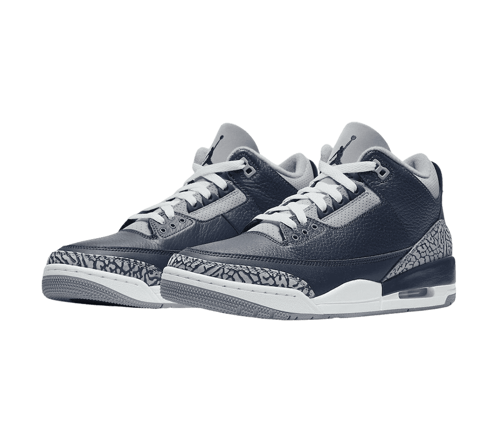 A pair of navy AJ3 “Georgetown” sneakers with white midsoles and gray and black elephant print tips and heels.