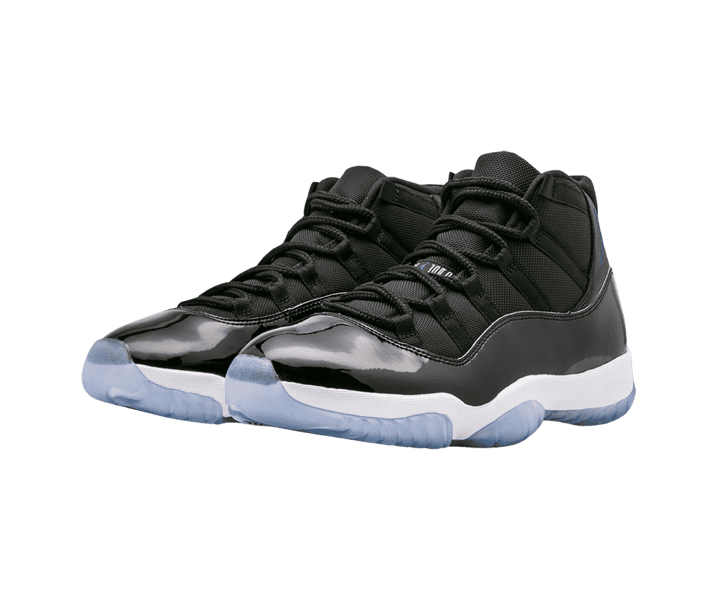 A black pair of AJ11 “Space Jam” sneakers in leather and canvas, white midsoles, and light blue translucent outsoles.