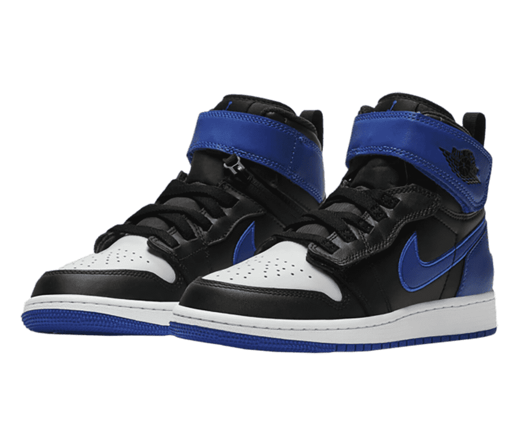 A pair of AJ1 Hi FlyEase sneakers in black uppers, white toeboxes and midsoles, and blue Swooshes, heels, outsoles, and thick velcro strap covering the tongue.