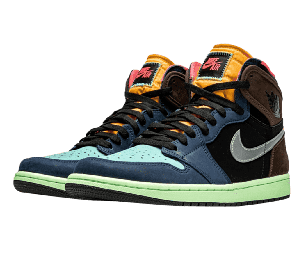 A pair of AJ1 “Tokyo Bio Hack” sneakers with dark blue and brown overlays, silver Swooshes, black quarters and laces, light blue toeboxes, light green midsoles, and orange tongues with salmon details.