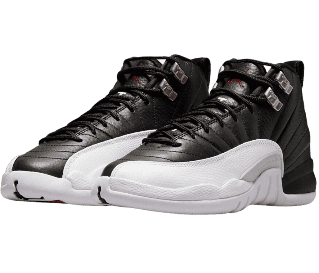 A pair of AJ12 sneakers in black leather, white mudguards, and metallic lace locks.