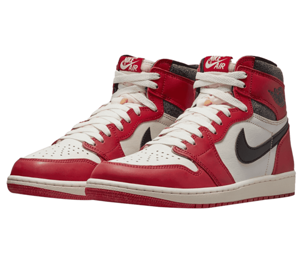 A pair of AJ1 Retro High “Chicago” sneakers in red and white, with black Swooshes, and cracked leather on the collar.