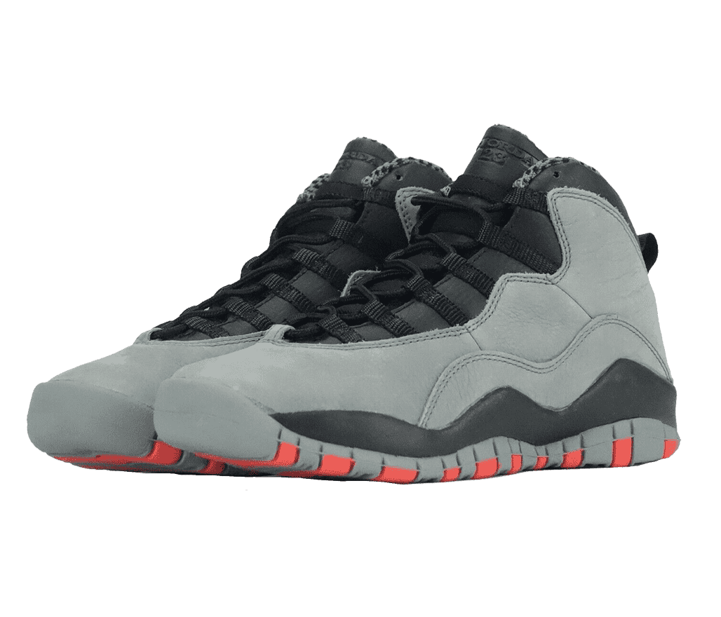 A black pair of AJ10 “Cool Grey” sneakers with wavy gray overlays and bright red sections on the soles.