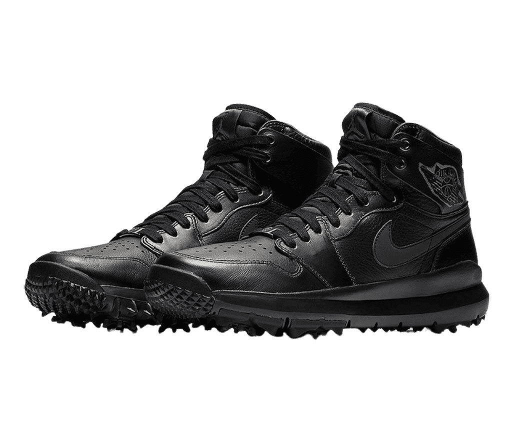A pair of AJ1 “Triple Black” Golf sneakers in all-black leather with black spokes at the bottom.