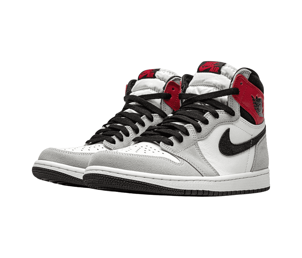 A pair of AJ1 sneakers with white uppers, light gray overlays, black laces, Swooshes, and outsoles, and red collar straps.