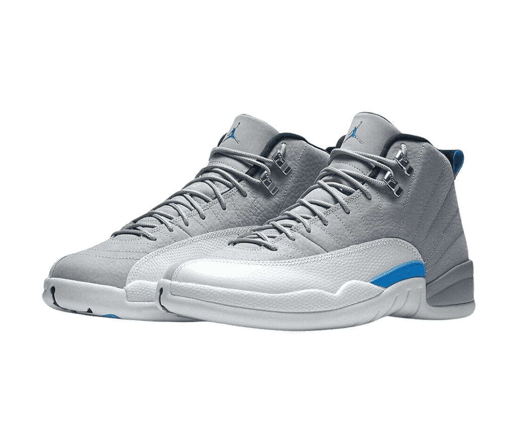 A pair of AJ12 sneakers with gray uppers, white soles and mudguards, and blue details on the soles.