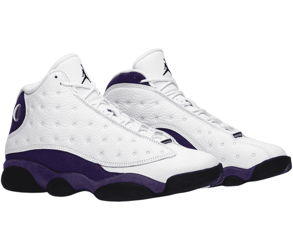 A pair of AJ13 “Lakers” sneakers with white uppers, black soles, and dark purple midsoles.