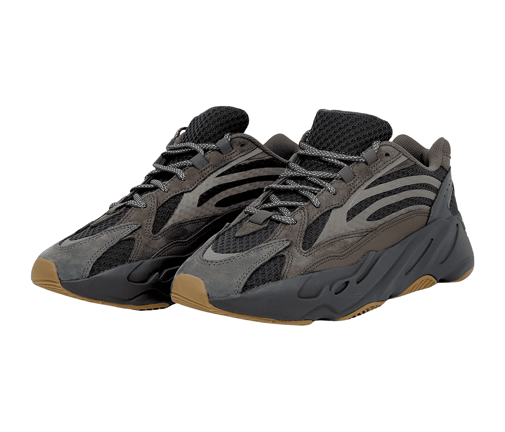 A pair of Yeezy Boost 700 V2 “Geode” sneakers in dark gray mesh and brown suede.