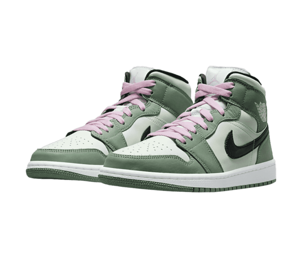A suede pair of AJ1 Mid sneakers in two shades of pastel greens, pink laces, and black Swooshes.