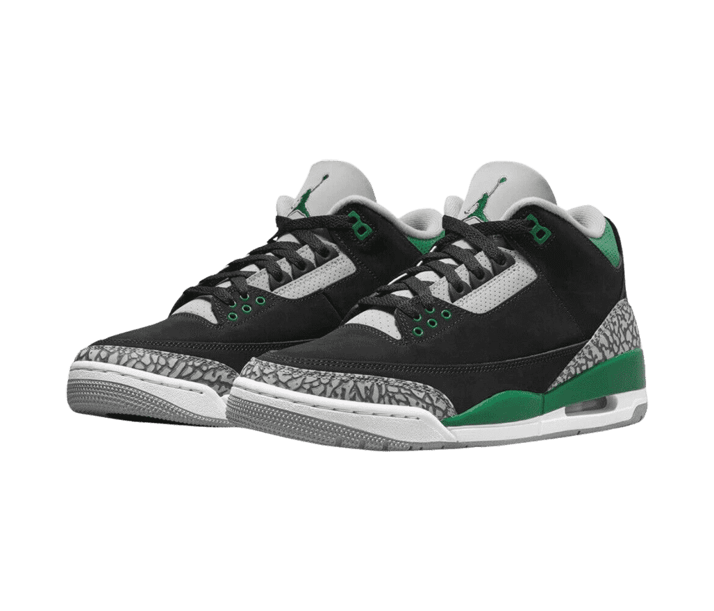 A black suede pair of AJ3 sneakers with gray elephant print heels and tips and green detailing.