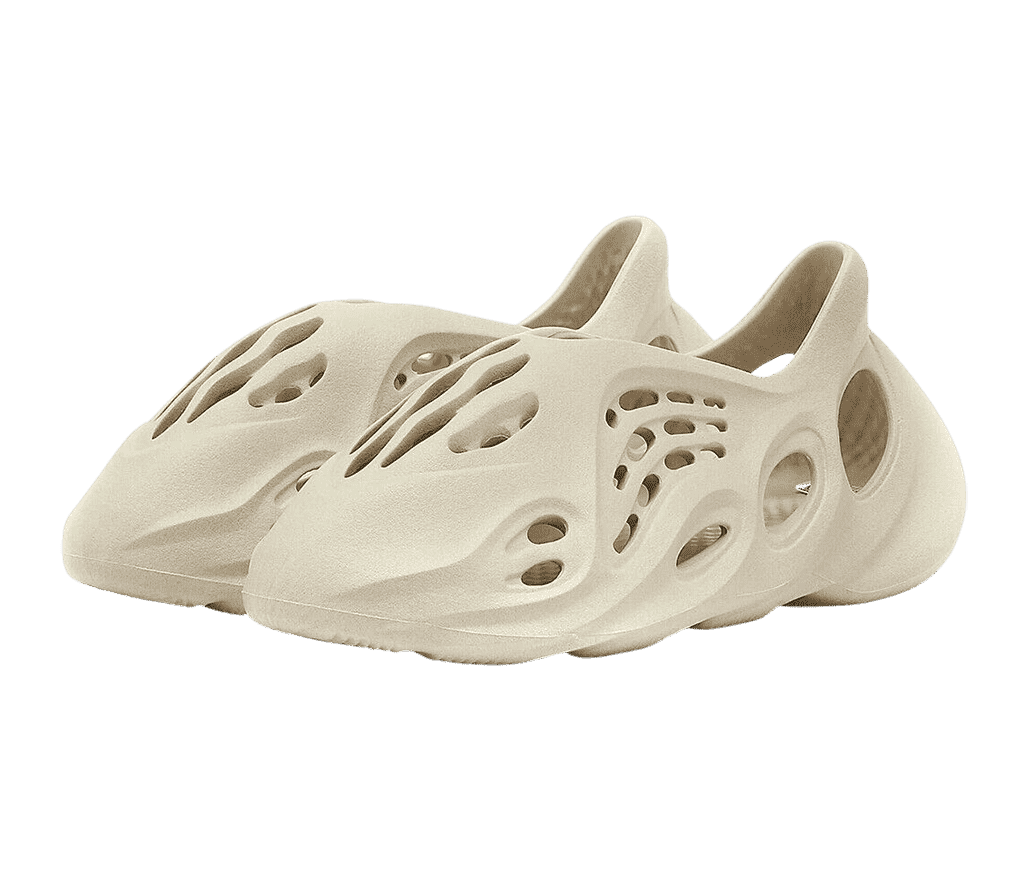 A pair of YEEZY 'Foam Runners' in the color sand.
                      They have a porous design and are made of a combo of algae and EVA foam.