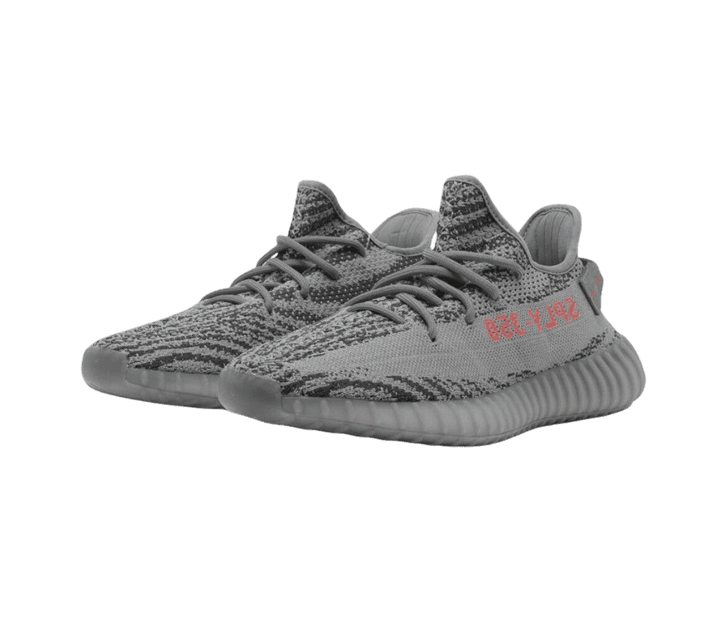 A pair of grey YEEZY sneakers with a black cotton
                      canvas and red text that says 'SPLY-350' on the side.