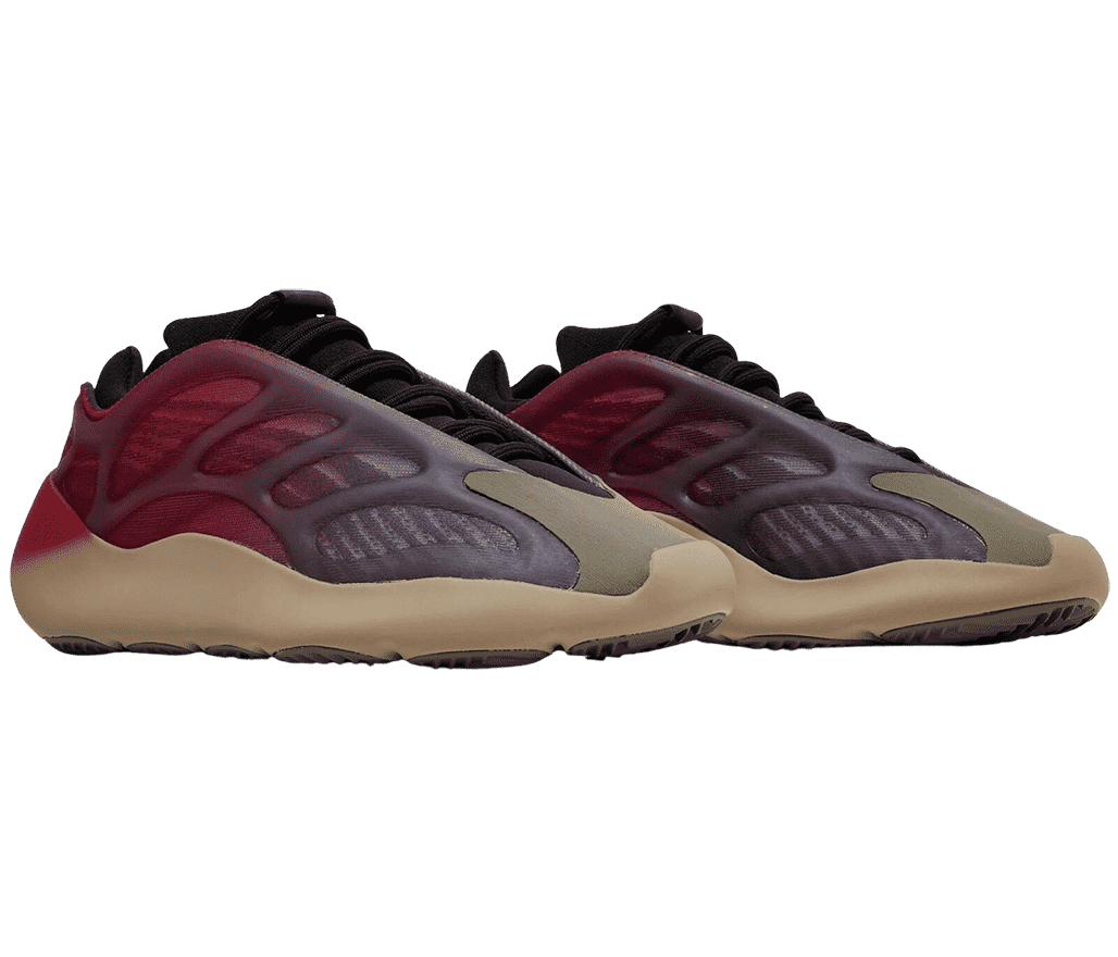 A pair of YEEZY 700 in a gradient dark red to grey along the semi-translucent side, and a brown boosted sole.