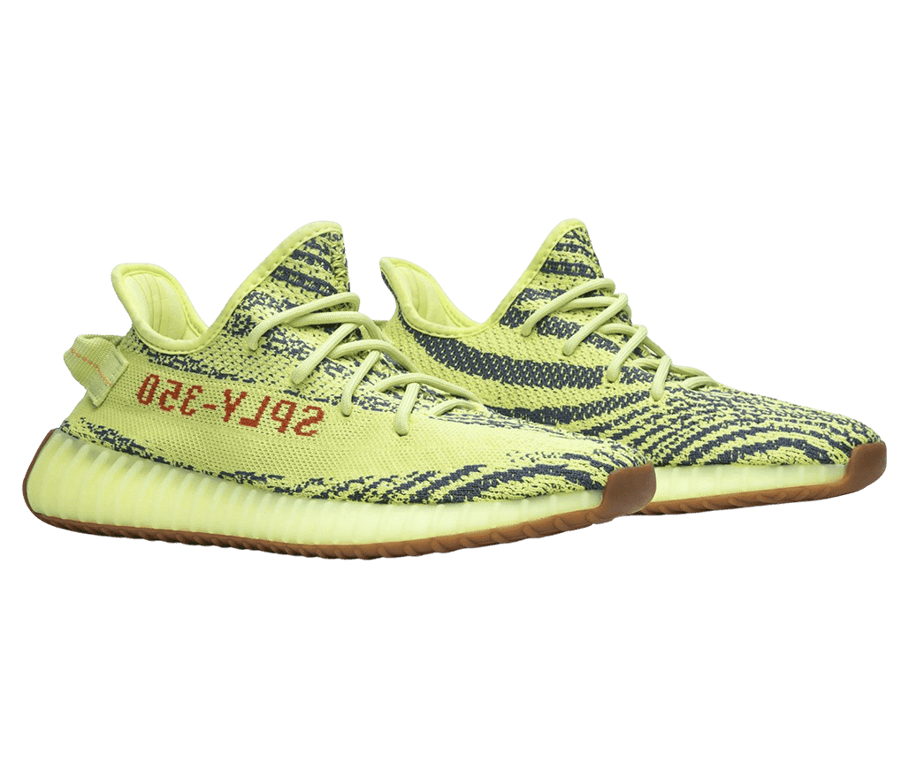 A pair of YEEZY 'Yecheil' sneakers neon yellow
                      textured cotton canvas and collar, sole, and laces.