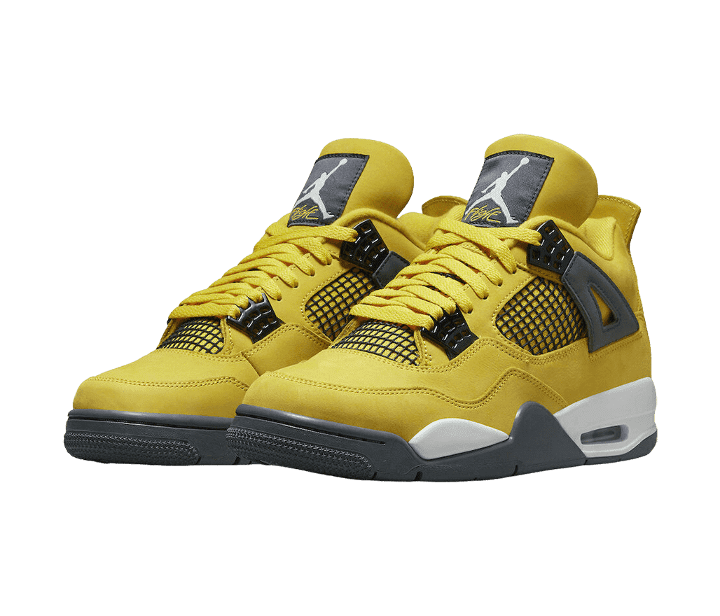 A golden yellow suede pair of AJ4 sneakers with yellow lining, dark gray lace cages and outsoles, and white midsoles.