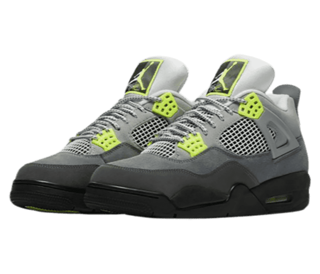 A pair of AJ4 sneakers in several shades of gray suede with black outsoles and neon green lace cages.