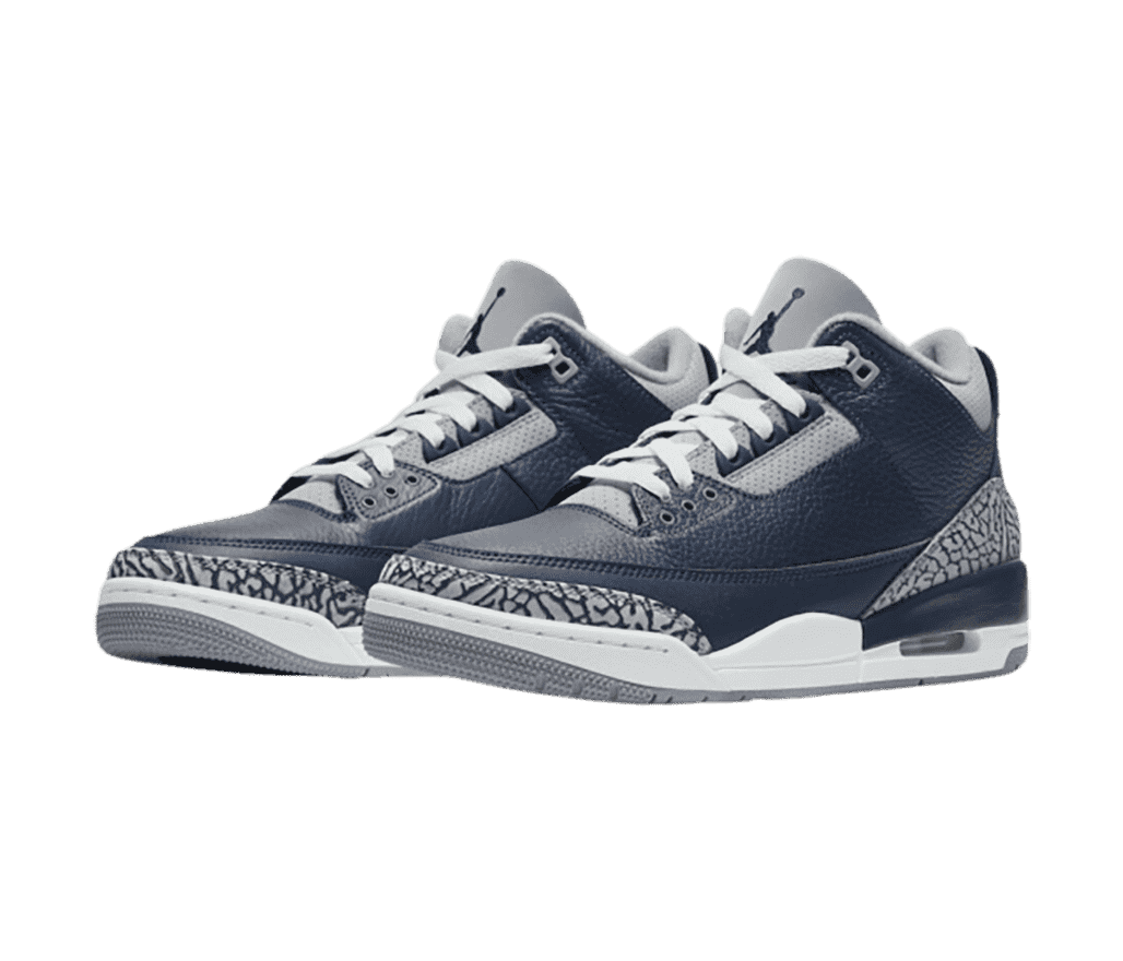 A navy pair of AJ3 sneakers with blck and gray elephant print tips and heels.
