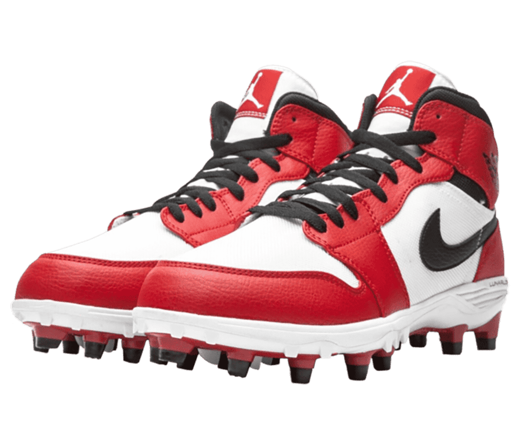 A pair of AJ1 TD Mid “Chicago” sneakers in red, white, and black leather with red and black football cleats.