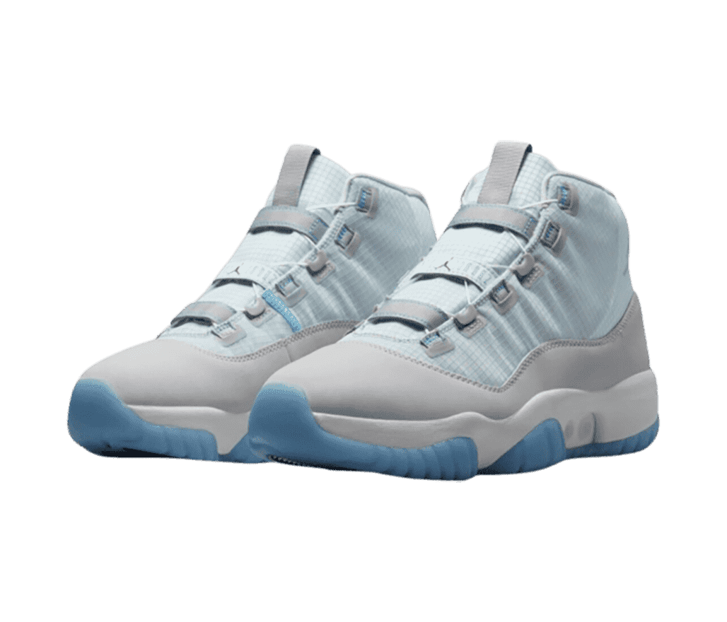 A pair of AJ11 Adapt “Legend Blue” sneakers in light blue nylon uppers, gray suede overlays, and blue outsoles.