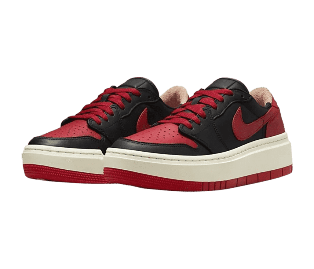 A pair of AJ1 Elevate Low sneakers in black and red with off-white platform soles and tan fleece lining.