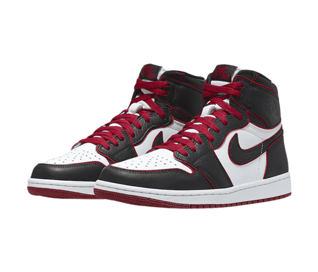 A pair of AJ1 High sneakers with white toeboxes and quarters and dark gray overlays that are outlined in red.