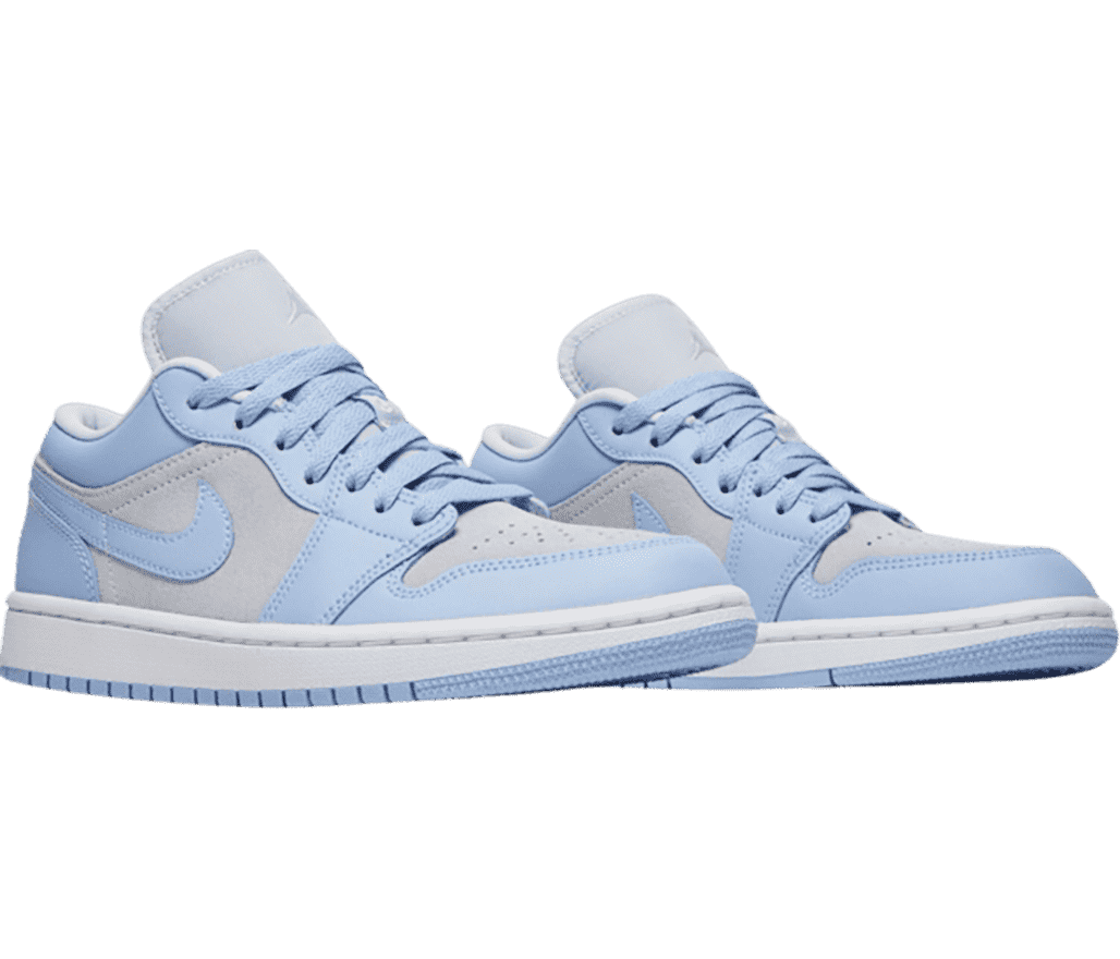 A pair of AJ1 Low “Aluminum” sneakers with light gray quarters and toeboxes and light blue overlays, laces, and outsoles.