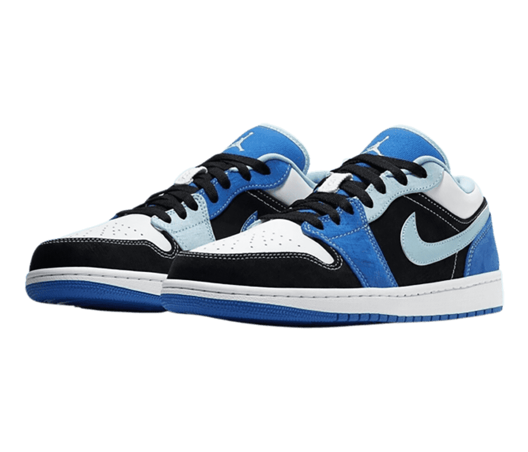 A pair of suede AJ1 Low sneakers with black and shades of blue overlays.