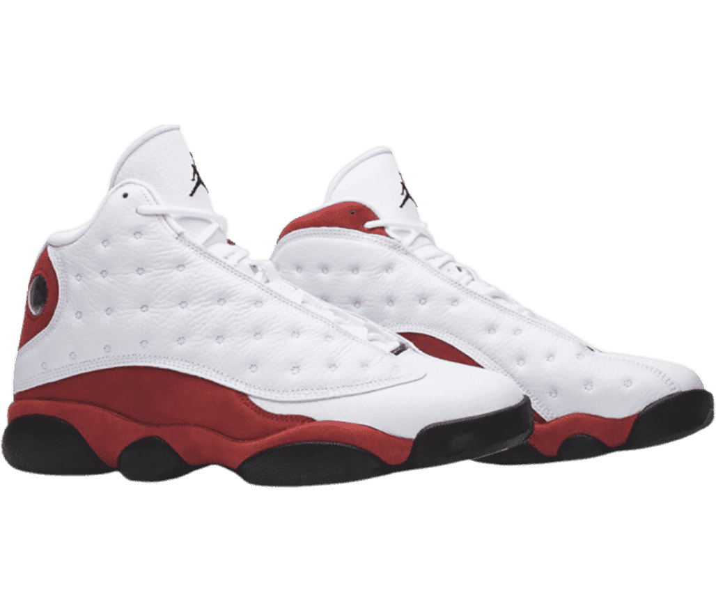 A white pair of AJ13 sneakers with red suede quarters and collars.