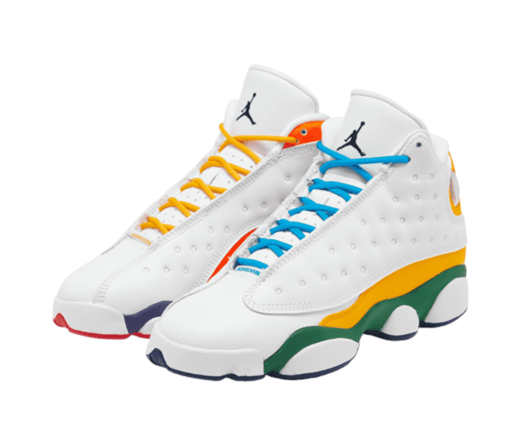 A white pair of AJ13 “Playground” sneakers with mismatched multicolored laces, midsoles, collars, and quarters.