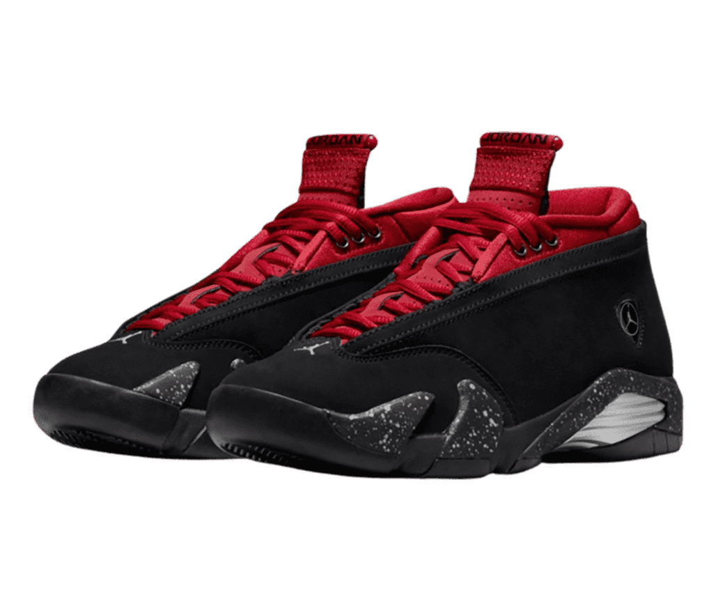 A black pair of AJ14 “Red Lipstick” sneakers with red tongues, laces, and collars and speckled panels on the soles.